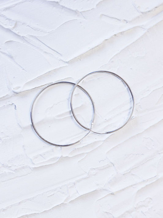 RIVER + SPIRIT HOOPS IN SILVER
